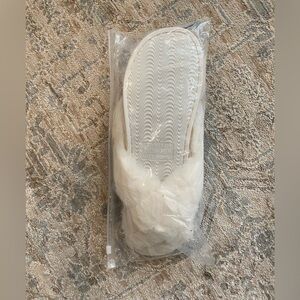White fuzzy slippers